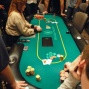 Justin Bonomo goes all-in and doubles up with an Ace high diamond flush