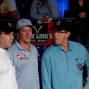 Mike Matusow, Erick Lindgren, and Orel Hershiser watch the final table
