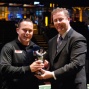 Aaron Benton poses with his new mantlepiece