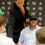 Thomas Kremser counts Bassam Elnajjar's chips.
