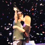 A trophy, a ton of money and a kiss from a beautiful woman... it's good to be the champ!