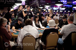 The cameras roll as Phil Hellmuth keeps his seat.