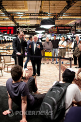 Joseph Cheong and Aubin Cazals conferencing with WSOP staff