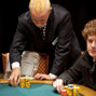 Tournament Director Robbie Thompson stacks Will Failla's chips