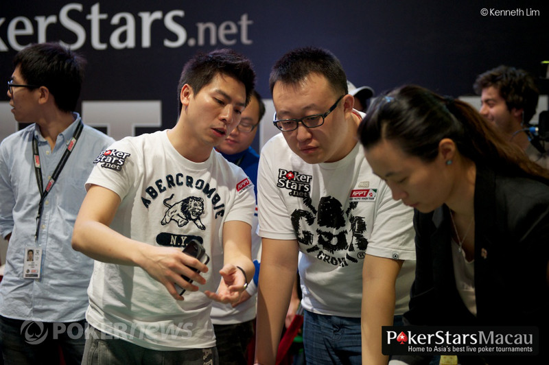 Ying Kit Chan and Xing Zhou discuss a deal