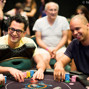 Antonio Esfandiari and Phil Ivey with Esfandiari's father in the background
