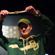 Jared Hamby holds his gold bracelet aloft