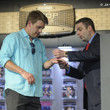 Jack Effel presents the gold bracelet to Mike Kachan for Event #56: $1,000 No-Limit Hold'em