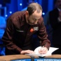 Barry Greenstein signs book for Jeff Lisandro