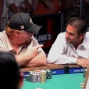 Darvin Moon and James Calderaro  talk after a big pot