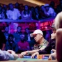 Johnny Chan putting his money in.