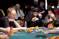 Phil Hellmuth shows Jon Turner the 4 of clubs, thus busting him out of the tournament.