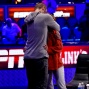 David Sands gives girlfriend, Erika Moutinho, a hug after he busted out in 30th. place from the Main Event.
