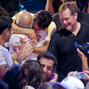 Antonio Esfandiari shares a ahug with his father, Bejan, after winning the Big One For One Drop Tournament.