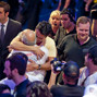 Antonio Esfandiari shares a ahug with his father, Bejan, after winning the Big One For One Drop Tournament.