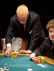 Tournament Director Robbie Thompson stacks Will Failla's chips