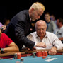 TD Robbie Thompson counts out Eliyahu Levy chips after he tripled up.  Tomas Trampota, left, is the contributor of the chips.