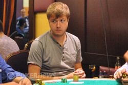Petter Jetten (Day 1b) gets back some of his chips.