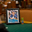 A portrait of Dr. Jerry Buss sits on the table next to an honarary stack of chips for $2500 Seven Card Stud Event at the WSOP.