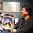 David Chiu receving his framed picture
