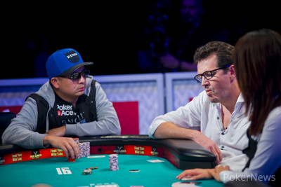 JC Tran, left, stares down an all-in Fabian Ortiz - 17th Place
