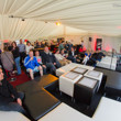People watching the live stream from the comfot of the player's tent