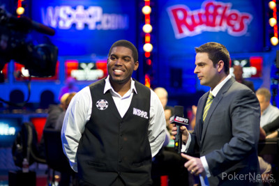 WSOP Tournament Director Jack Effel, r, introduces the 2013 WSOP Dealer of the Year, Belvy Dalton, left.