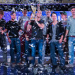 Martin Finger joined on stage by his friends to celebrate his Super High Roller win