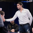 Florian Ribouchon shakes hands with his table mates