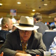 Jeff Grimes checks his hole cards.