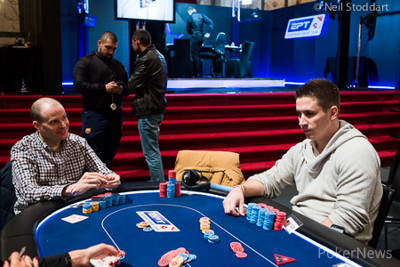 Kovacs (right) tries to burn a hole in the table. Photo courtesy of the PokerStars Blog.