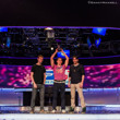 Daniel Colman holds his trophy aloft