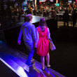Sebastian Bredthauer leaves the stage with his girlfriend
