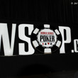 WSOP.com sign lights up the Pavilion Room stage