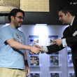 Jack Effel presents the gold bracelet to Sean Dempsey for Event 39