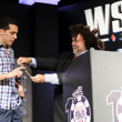 Nolan Dalla presents the gold bracelet to Hugo Pingray, Winner of Event #51: $1,500 No-Limit Hold'em Monster Stack