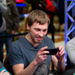 Gleb Tremzin takes a photo of the board