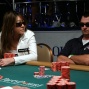 Maria Ho stares down Kevin Farry after he moves all in from the small blind