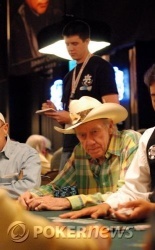 PokerNews field reporter Neil Fray watches over Amarillo Slim's table