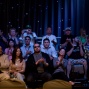 The audience welcomes the players