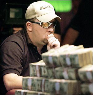 Chrisas Moneymakeris prie finalinio stalo