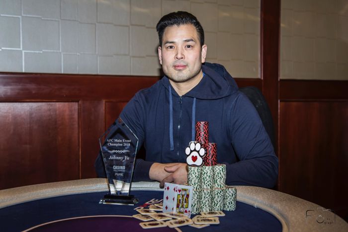 Johnny Yu with 2018 Alberta Poker Championship trophy at Casino Yellowhead
