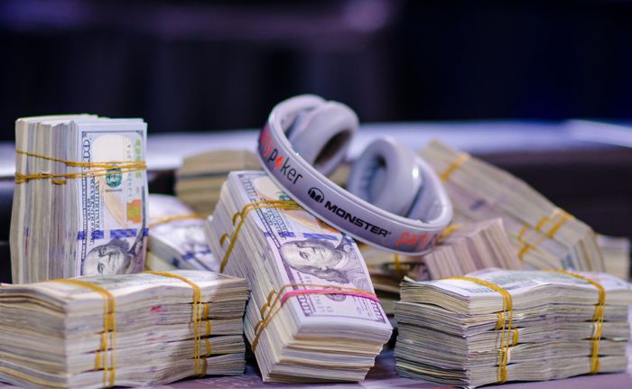 Poker Money - stacks of dollars at a partypoker event