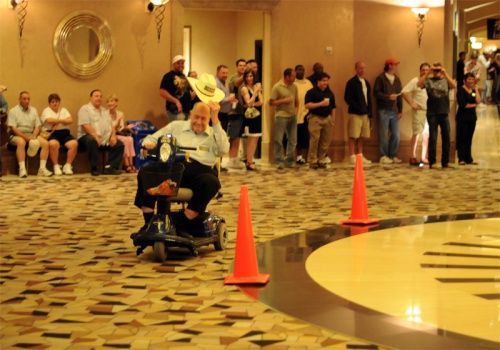 Doyle Brunson in a scooter race!