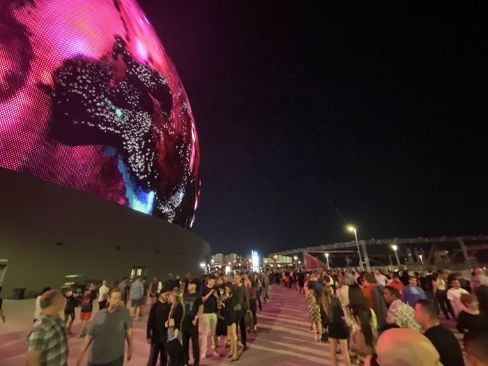 Attendees wait in line outside the Sphere on Oct. 6, 2023