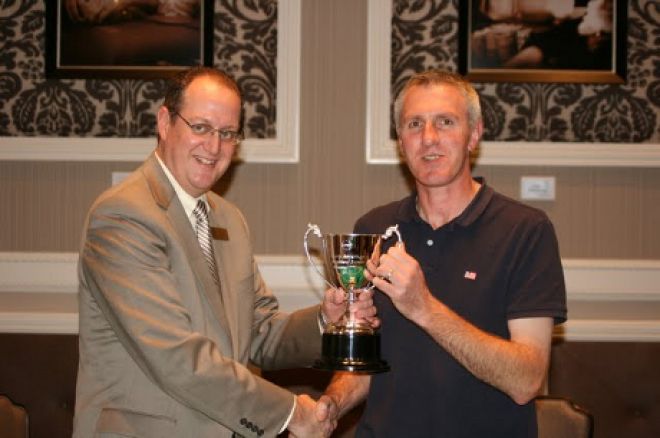 Michael Paterson receives his trophy from Charles Nister Michael Paterson receives his trophy from Charles Nister