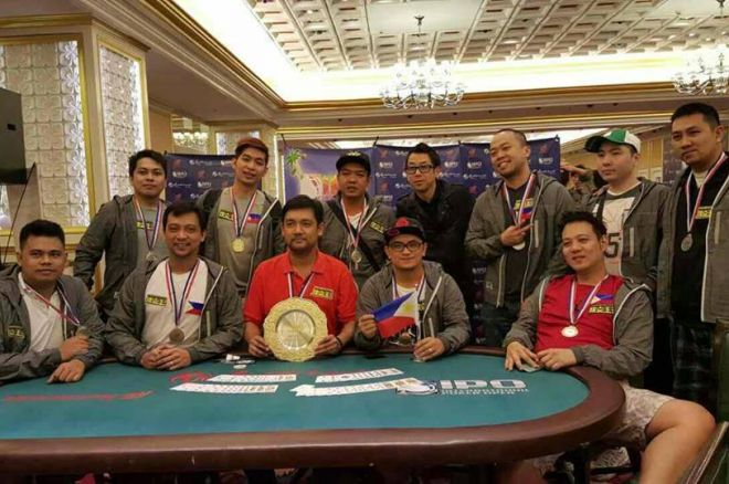 Team Poker King Club-Pilipinas with PKC president and CEO Winfred Yu during the awarding ceremony of the International Poker Ope