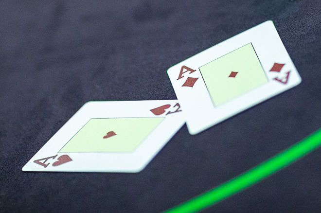 Call or Fold to a River Bet With Pocket Aces?