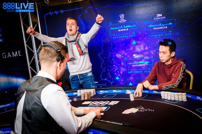 Marco Biavaschi wins 888poker LIVE Madrid Main Event; He lifts the trophy and smiles after securing victory