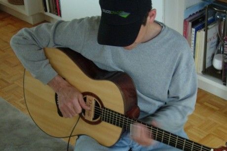 Poker author and coach Tommy Angelo, strumming away the tilt